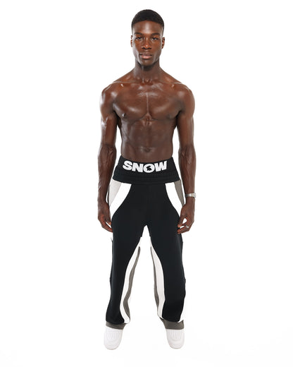 Front view of male model wearing Snow Bunny sweatpants